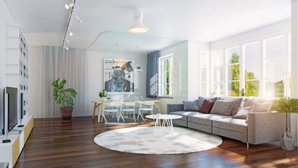 Professional maid service keeping a sunlit living room spotless.