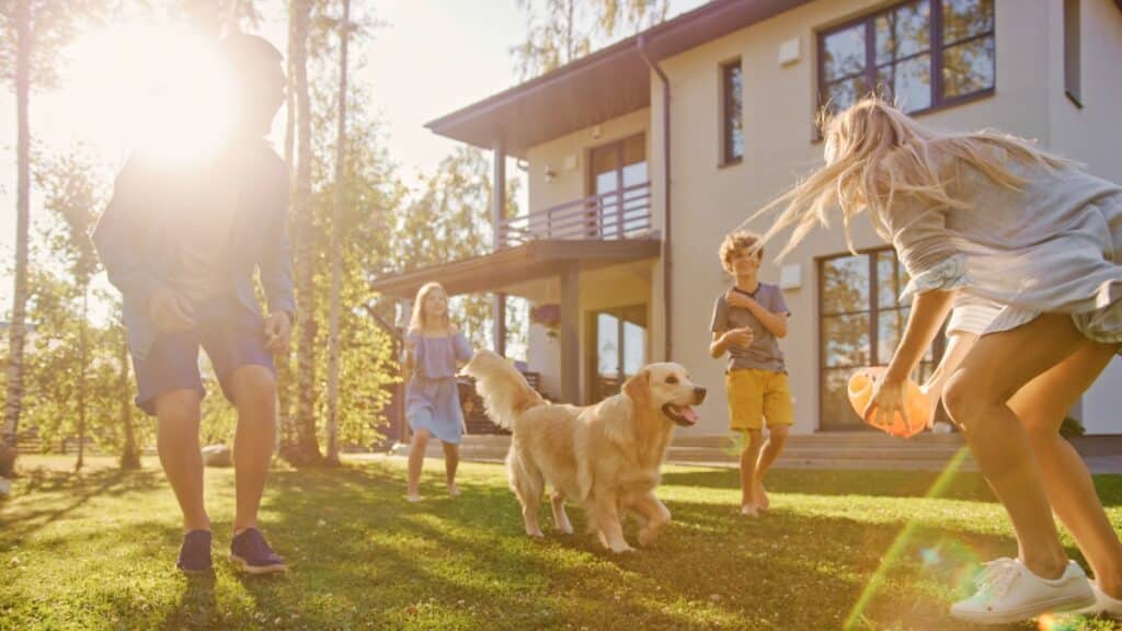 Family enjoying a tidy home with their dog and residential cleaning support.