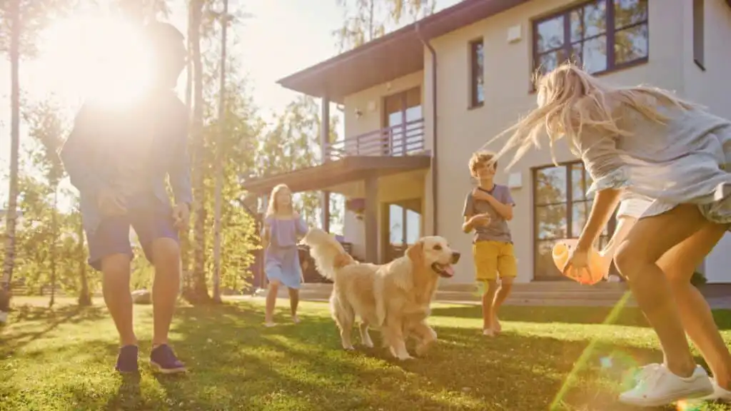 Family enjoying a tidy home with their dog and residential cleaning support.